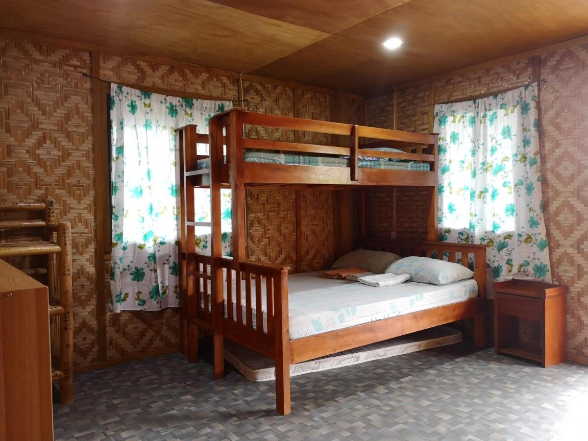 Titanic'S Nipa Hut Hostel Moalboal Ngoại thất bức ảnh