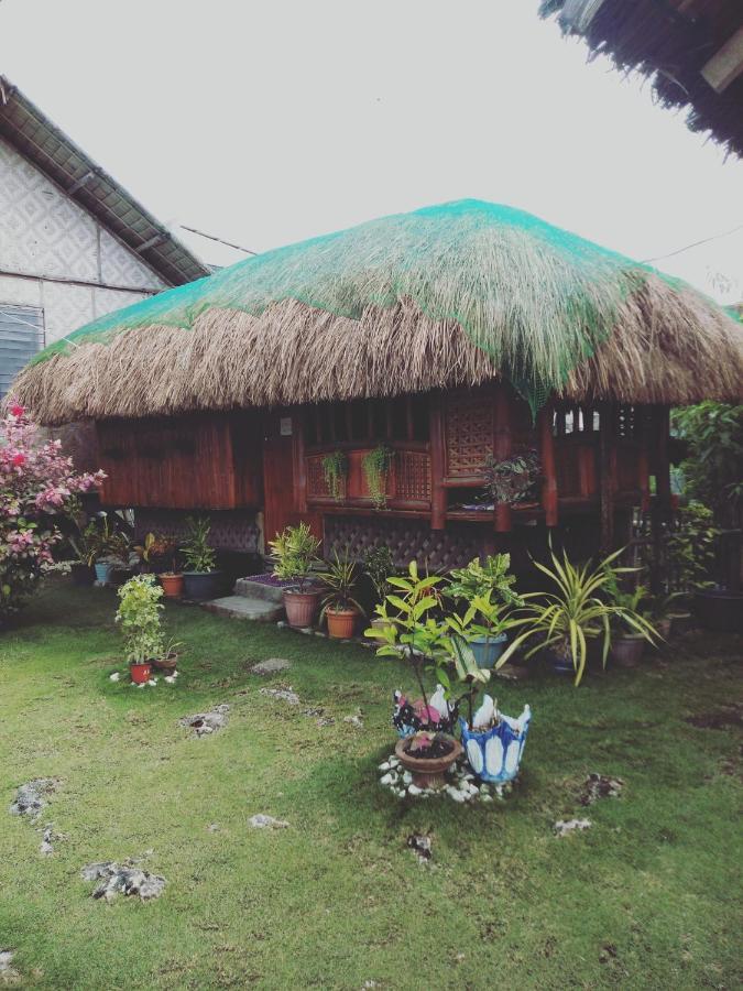 Titanic'S Nipa Hut Hostel Moalboal Ngoại thất bức ảnh