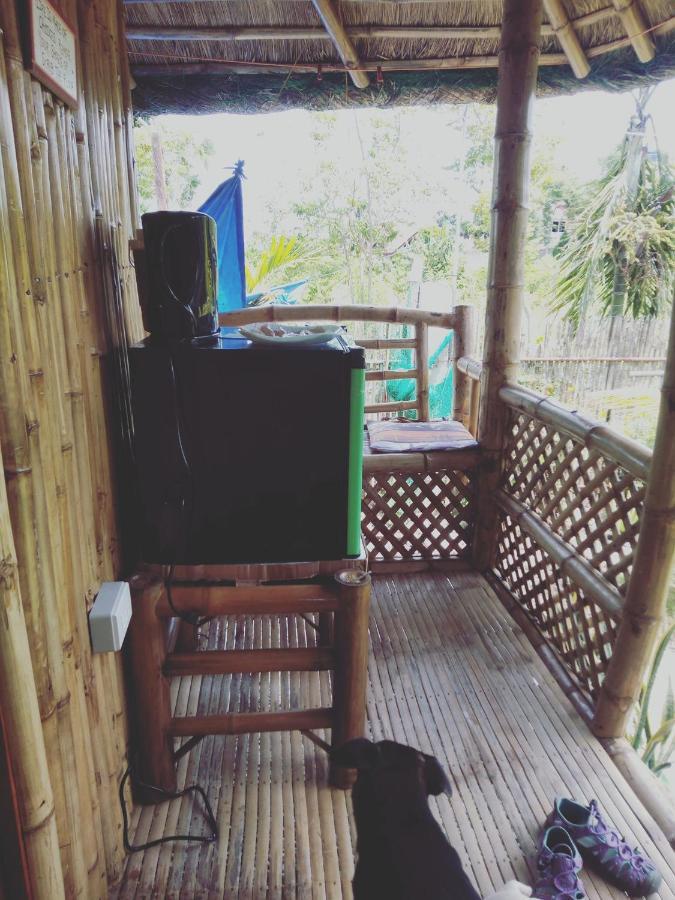 Titanic'S Nipa Hut Hostel Moalboal Ngoại thất bức ảnh