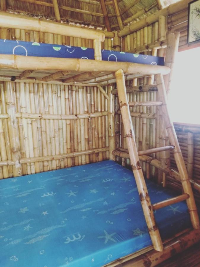 Titanic'S Nipa Hut Hostel Moalboal Ngoại thất bức ảnh