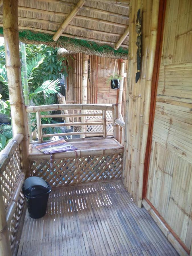 Titanic'S Nipa Hut Hostel Moalboal Ngoại thất bức ảnh