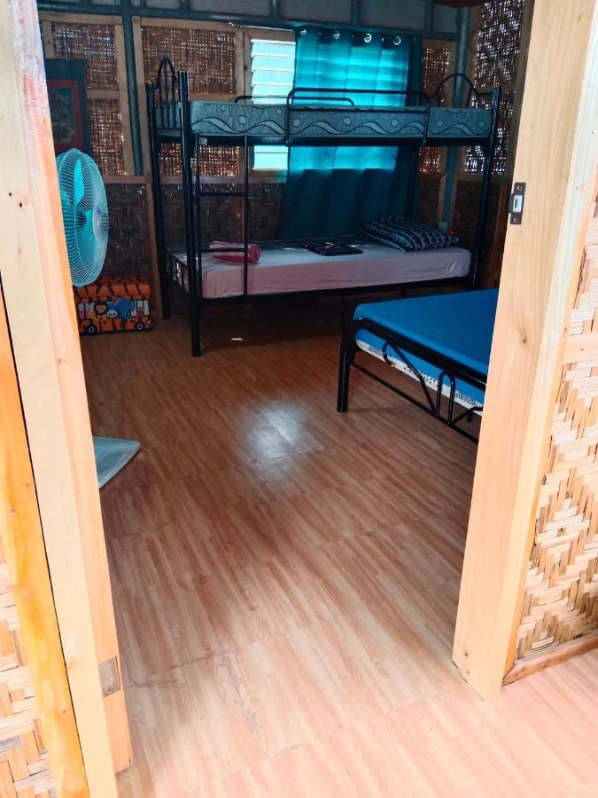 Titanic'S Nipa Hut Hostel Moalboal Ngoại thất bức ảnh