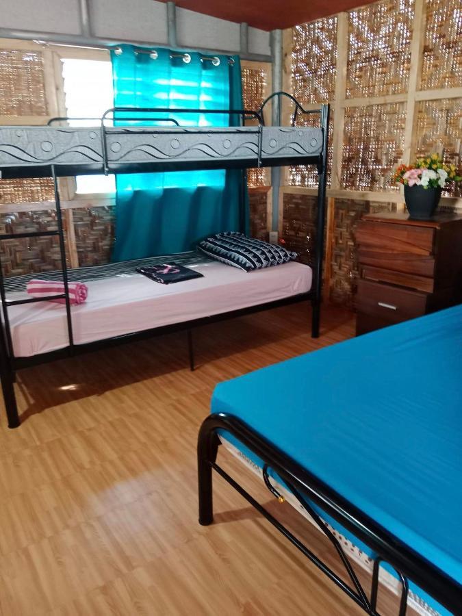 Titanic'S Nipa Hut Hostel Moalboal Ngoại thất bức ảnh